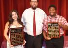 Ricky Hanes and Ariana Salazar with Coach James Richardson for Most Valuable Player for Girls and Boys Powerlifting.