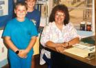 Felton, pictured in fifth grade with his sister, Dr. Summer Felton Odom, and their teacher, Mrs. Cindy Melcher, sports his high-top basketball shoes during the years Melcher taught fifth and sixth grade. Her infectious smile was a constant throughout the Felton, pictured in fifth grade with his sister, Dr. Summer Felton Odom, and their teacher, Mrs. Cindy Melcher, sports his high-top basketball shoes during the years Melcher taught fifth and sixth grade. Her infectious smile was a constant throughout the