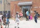 Families and children gather outside of Milam County Jail visitation during the Spooktacular Fall Festival Saturday.