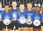 Members of the 8U Cameron Storm II volleyball team are: L to R: Bree Parker, Kate Feggestad, Kara Mays, Kynzler Poe, Scarlett McMurtray, Harper Gommert, Kyleigh Morrison, Jaysi Hillman, and Alexi Lander. Coach: Linda Richter.