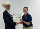 Kyla Honeycutt with Sheriff Mike Clore. Photo courtesy of Milam County Sheriff’s Office