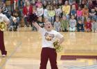 Cheerleaders get the students and staff excited just before the surprise announcement of Morrison’s finalist status.