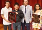 Coach Lance Hause with Jesse Flores, Alejandro Silva, and Jasdan Llanas for Most Valuable Player for both Boys and Girls tennis.