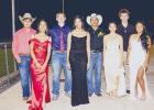 A brief cold front swept through Cameron this week, but it couldn’t cool the Flame Pep Rally — or the queen nominees braving the chill in their formal dresses. Photos Courtesy of Gabriella Rodriguez