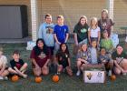 Proud Bulldogs take a quick photo after the corn shucking challenge during lunch Thursday, Oct. 23 in observance of the Texas Department of Agriculture’s Farm Fresh Challenge. Proud Bulldogs take a quick photo after the corn shucking challenge during lunch Thursday, Oct. 23 in observance of the Texas Department of Agriculture’s Farm Fresh Challenge.
