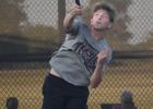 Kelton Driska smashes a shot back at his opponent last week during Cameron Yoe’s district match with Academy. Kelton Driska smashes a shot back at his opponent last week during Cameron Yoe’s district match with Academy.