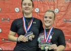 Jordyn Stutts (right) is a 3-peat State Champion in powerlifting. Riley Shock (left) also had a strong performance, placing fifth in her class. Photo from Thorndale ISD Athletics Facebook Page Jordyn Stutts (right) is a 3-peat State Champion in powerlifting. Riley Shock (left) also had a strong performance, placing fifth in her class. Photo from Thorndale ISD Athletics Facebook Page