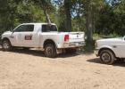 Buckholt Construction trucks gathered at a build site.