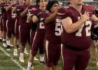 The Milano Eagles varsity football team and cheerleaders get ready for the National Anthem, prior to the start of last Friday’s nondistrict home game with the Moody Bearcats.