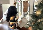 Thorndale High School FCCLA members hang holiday decorations at the S.P.J.S.T. Senior Living Center in Taylor during the club’s annual service visit, where students helped prepare the campus for the upcoming season. Courtesy Photo