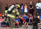 Cameron volunteer fire fighters teach Cameron students about fire safety. Photo courtesy of the City of Cameron Cameron volunteer fire fighters teach Cameron students about fire safety. Photo courtesy of the City of Cameron