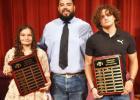 Coach Edgar Luna with Adawnia Young and Theoden Young for Most Valuable Player for Girls and Boys Wrestling.