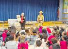 Geri Burnett explains the importance of collecting artifacts only on your own land. Photos Courtesy of Milam County Historical Commission
