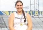 Bethany Preusse wins the gold in shot put to advance to state.