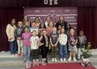 Ben Milam Elementary UIL participants are pictured with their coaches. Top row (left to right): Kate Feggestad, Everett Pieper, Ricky Vela, Kara Mays, Jaysi Hillman, Esperanza Carranza and Kyleigh Morrison. Bottom row (left to right): Alanna Llanas, Braxt