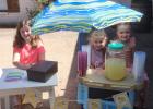 Peyton and Paisley Fuchs and Copeland Cargill serve up smiles at their second annual spring break lemonade stand. Peyton and Paisley Fuchs and Copeland Cargill serve up smiles at their second annual spring break lemonade stand.