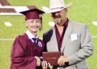 Jack McCall receives his diploma from John Anderle. Photo Submitted by Natalie Bettge