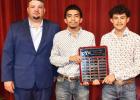 Edgar Velasquez and Homero Najera with Coach Gared Chandler for Most Valuable Player for Boys Soccer.