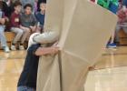 Morrison enthusiastically greets H-E-Buddy after his finalist status is announced at the pep rally.