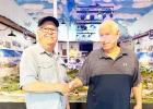 Milam County Railroad Museum Director (L) with retired Santa Fe railroad employee Jim Elliot (R). Photo from Milam County Railroad Museum