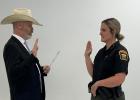 Sheriff Mike Clore swearing in Hannah Husher. Photo courtesy of Milam County Sheriff’s Office