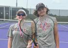 Yoe tennis compete in district meet