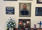 Sergeant Joshua Clouse was killed in the line of duty on May 11, 2023 protecting the citizens of Cameron.A memorial was dedicated in front of the Police Department last week. Above is a memorial inside the department with a painting of Clouse as well as o Sergeant Joshua Clouse was killed in the line of duty on May 11, 2023 protecting the citizens of Cameron.A memorial was dedicated in front of the Police Department last week. Above is a memorial inside the department with a painting of Clouse as well as o