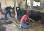 Go Texan Team Shoveling Coals at the Rockdale KC Hall Photo Courtesy of Trey Felton