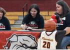 Thorndale Senior Jacie Leho signs an Athletic Grant-in-Aid agreement to play basketball at McPherson College Wednesday, Feb. 4 in the Thorndale school gym. Congratulations Jacie! Photo Courtesy of Thorndale ISD