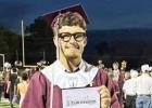 Brody Aguirre shows off his diploma after graduation. Photo Submitted by Ashley Vaculin Aguirre