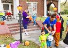 Susan Hajovsky Angely and husband Matt Angely hand out candy on Halloween evening. Courtesy Photos
