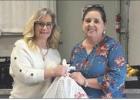 The Herald’s Kolette Morgan presents a donation to the Cameron Thrift Store Food Bank, made possible by the generosity of the paper’s readers. Courtesy Photo The Herald’s Kolette Morgan presents a donation to the Cameron Thrift Store Food Bank, made possible by the generosity of the paper’s readers. Courtesy Photo