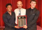 Coach Michael Koehl with Kallin Koehl and Xavier Gilmon for Most Valuable Player for baseball.