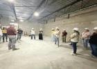 The Community Involvement Committee listens intently during their “hard hat” tour of the new Thorndale High School construction site during their first meeting Wednesday, Oct. 8. Photos Courtesy of Thorndale ISD