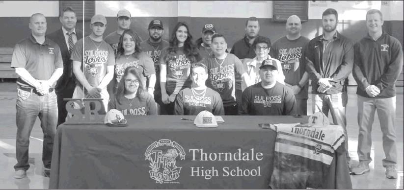 Teresa Ging/THE THORNDALE CHAMPION Scott Guzman signed his letter of intent to play baseball at Sul Ross University last week. Pictured, standing from left, are Coach Kelly Kuhl, Thorndale Head Baseball Coach; Coach Ford, Select Baseball Coach; Cory Huber